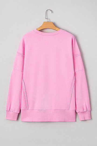 Pink Bow Sequin XOXO Letter Graphic Exposed Seam Baggy Sweatshirt